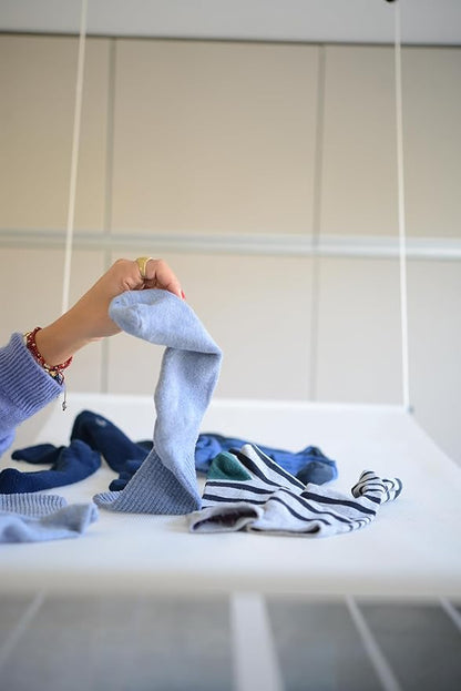 Mesh for drying delicate clothes on a ceiling clothesline