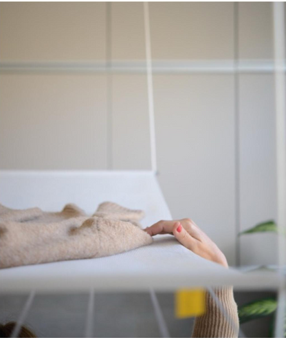 Mesh for drying delicate clothes on a ceiling clothesline